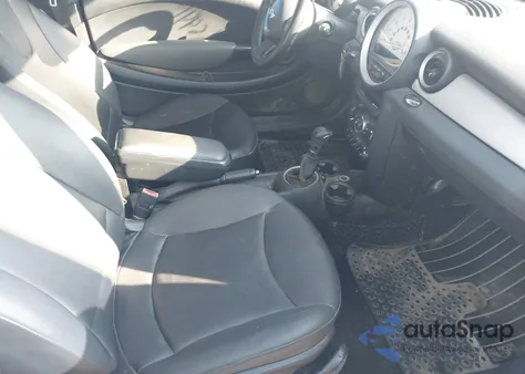 2011 Mini Cooper z USA, uszkodzony, nr VIN WMWSU3C57BT098433